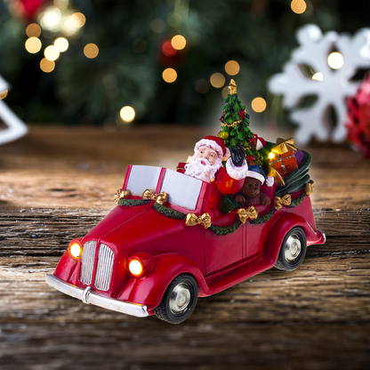 Babbo Natale in macchina con albero che gira